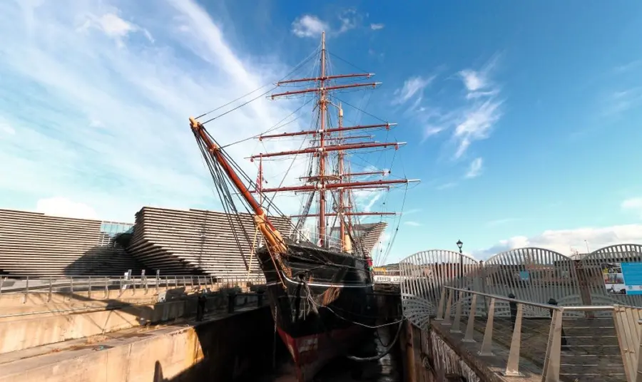 The tall ship RRS Discovery stands in dry dock neighbouring Dundee's branch of the Victoria and Albert Museum.