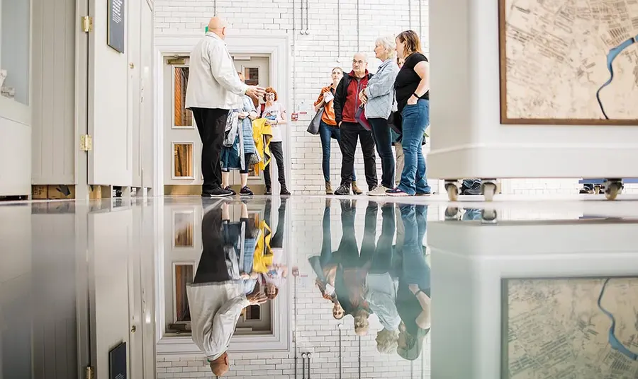 A guide leads a tour inside Templemore Baths