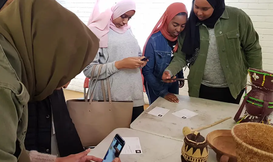 Women looking at exhibits