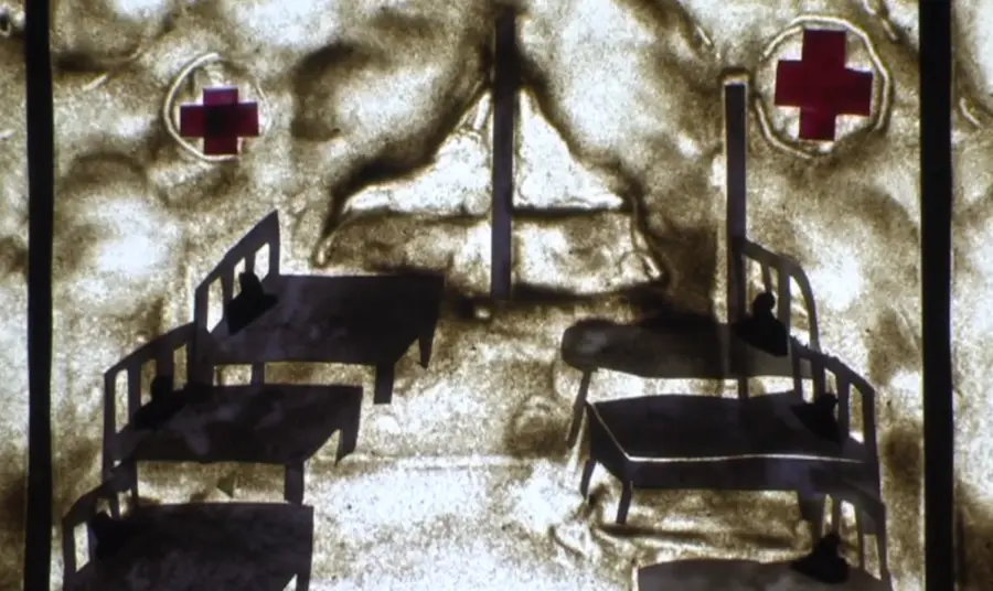a frame from an animated film, showing the inside of a desert hospital