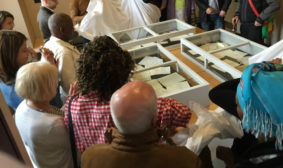 Participants looking at objects as part of the Great War to Race Riots