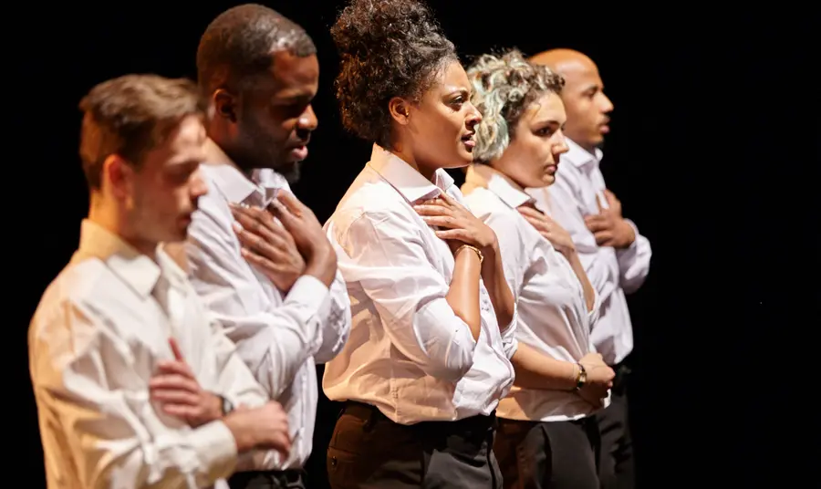 Members of Cardboard Citizens performing