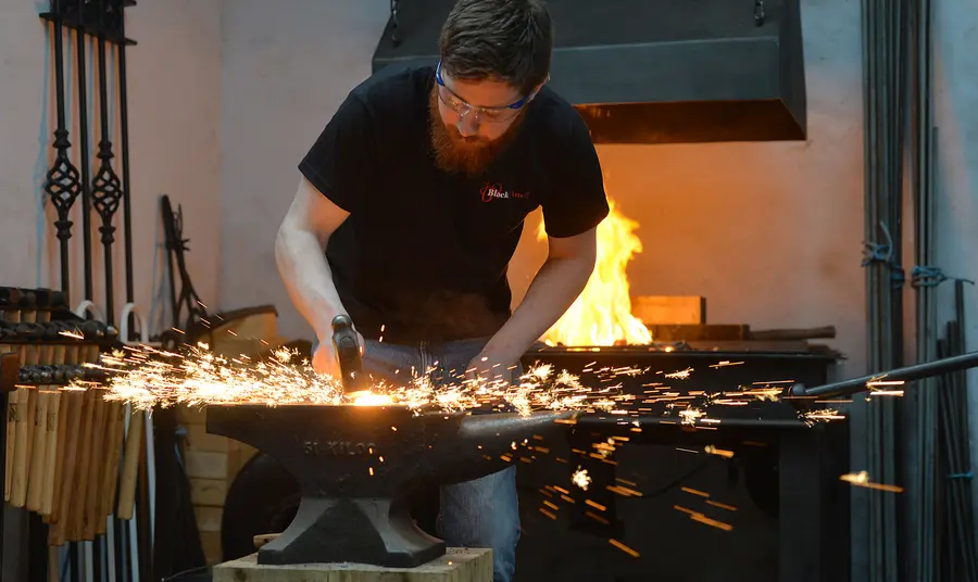 Life-changing: from Belfast welder to heritage blacksmith A blacksmith works at an anvil