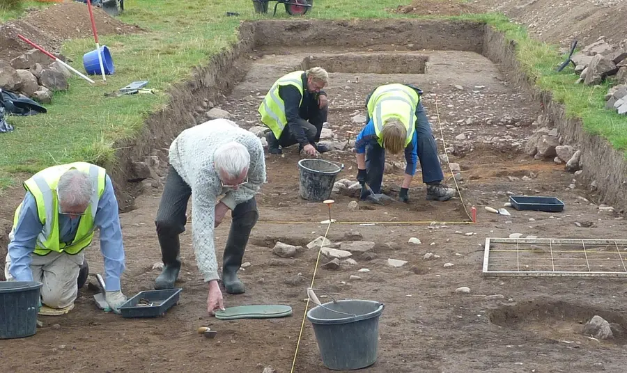 Volunteer archaeologists digging a trench as part of the Doncaster 1914-18 project