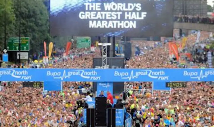 Runners grouped at the start of the race