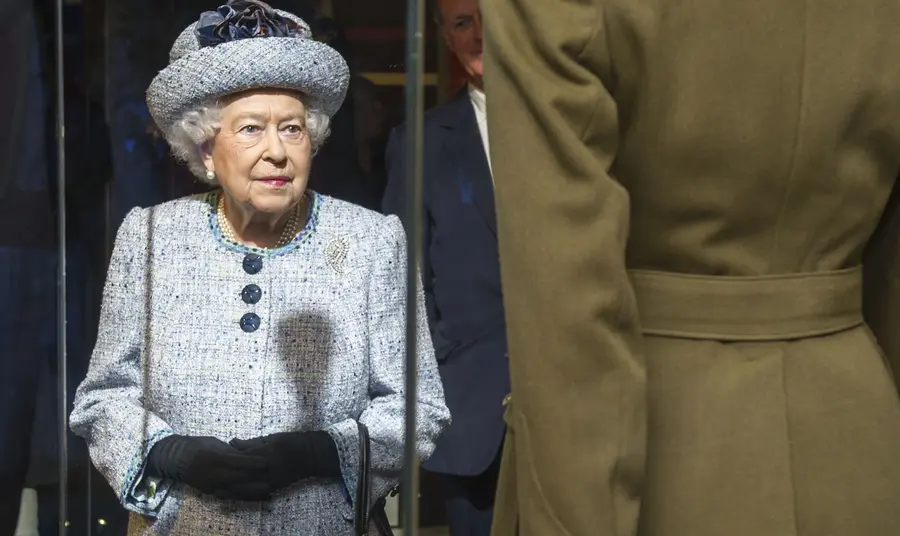 Her Majesty the Queen views her uniform, worn as an Honorary Brigadier in the Women's Royal Army Corps, in the National Army Museum