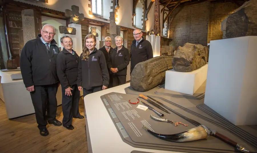 Volunteers and staff in the Monk's Dormitory