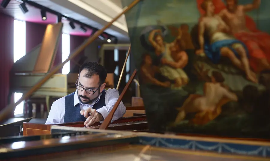 St Cecilia’s Hall transformation hits the right note Conservator Jonathan Santa Maria Bouquet tuning a harpsichord in the museum