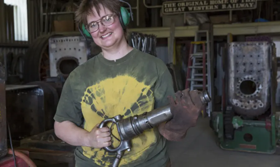Woman working as a boilersmith