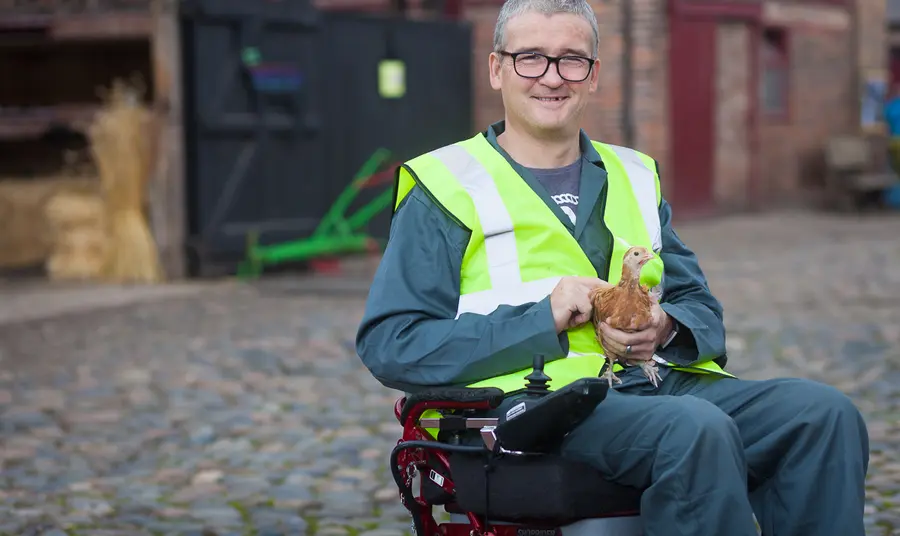 Man with chicken