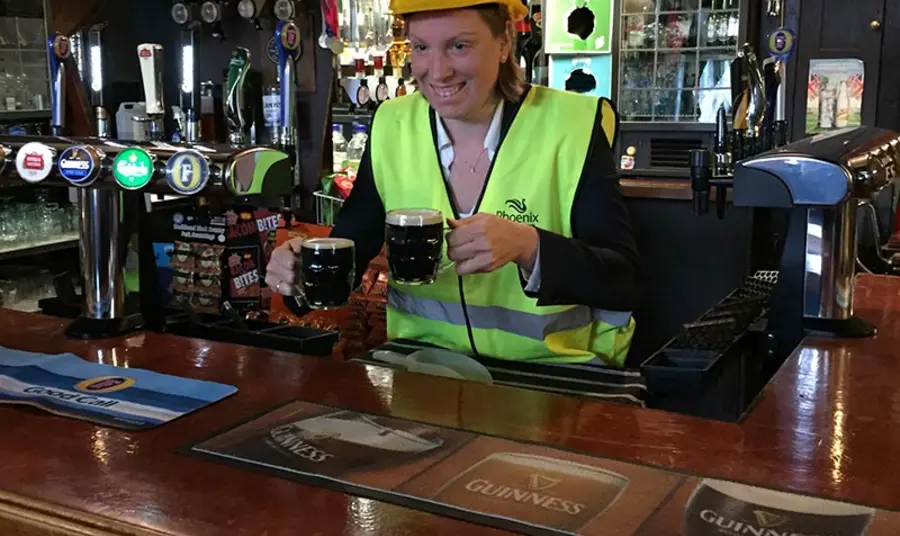 Heritage Minister Tracey Crouch pulling pints at The Fellowship Inn, Bellingham, South London