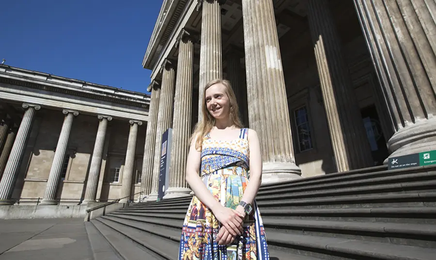 Jessica Starns outside her new workplace, the British Museum Jessica Starns stands outside the grand British Museum building, smiling