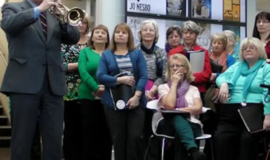 Audience listening to a rendition of The Last Post