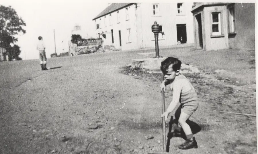 Two small boys in the street in Carrickmore in the 1940s