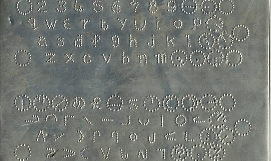 A moonboard used to teach blind people to read from the 1850s