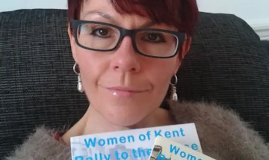 Jo Ursell, Project Manager at Groundwork South Kent & Medway, holding the books that form part of the Sisterhood and Solidarity 