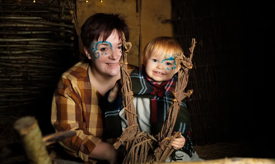 Mother and son in Iron Age dress