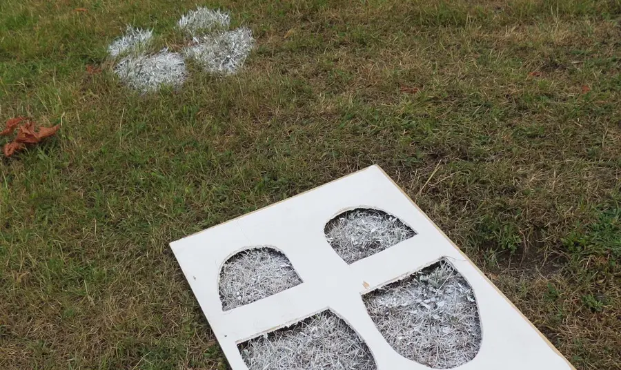 Exploring the First World War in the East of England Stencil of footprints on grass