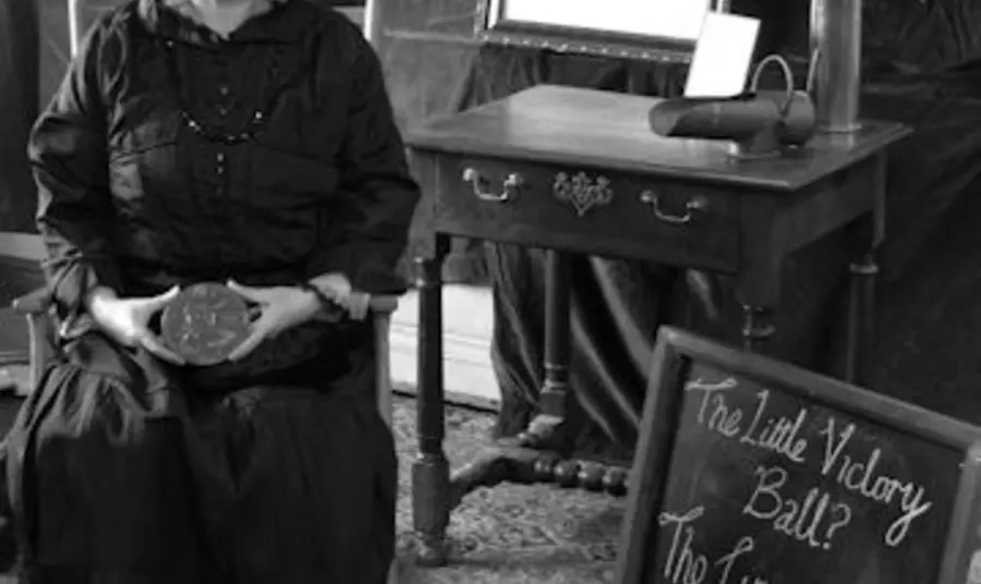 Photograph of widow in remembrance which forms part of the re-enactment project 'The Little Victory Ball' 