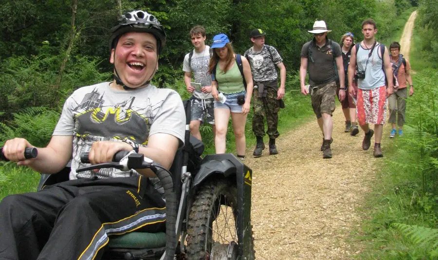 Wheelchair user joining walking group