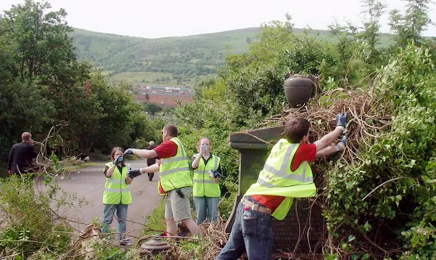People working to clear up the Cemetery