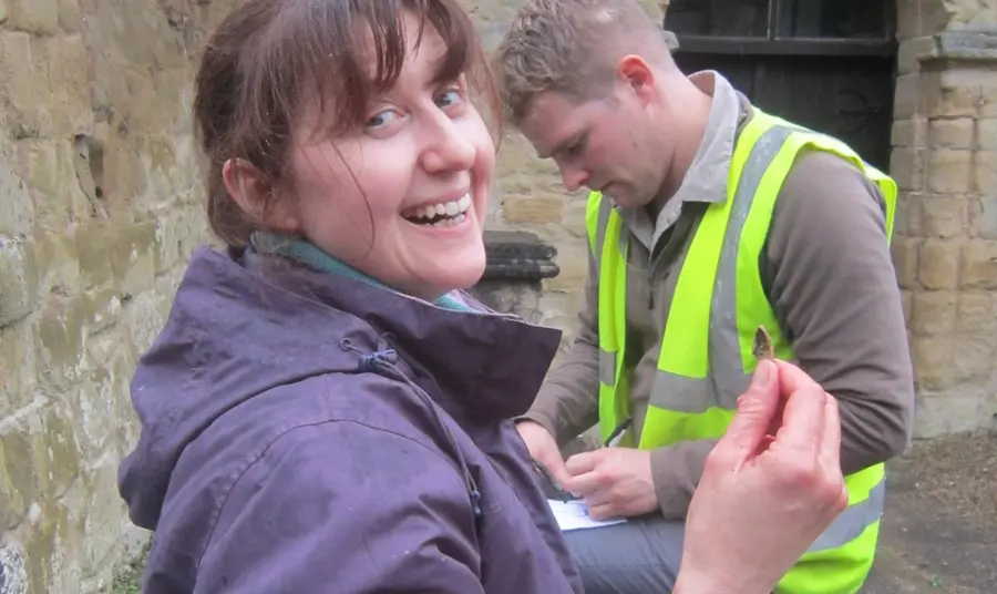 Volunteer with archaeological find at Abberley dig