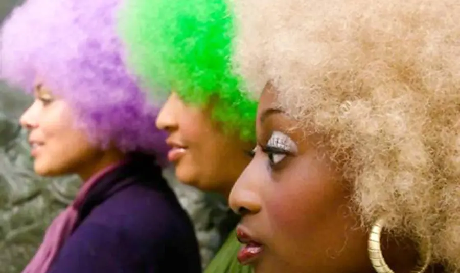 Women proud of diversity Women proudly wearing their diverse wigs