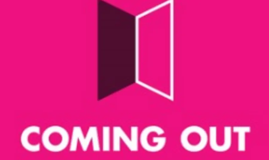 An open book on a pink background with the words coming out stories beneath