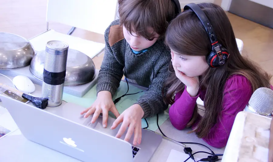 Children use a computer