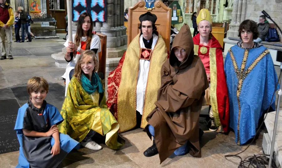 Young people in costume at Exeter Cathedral