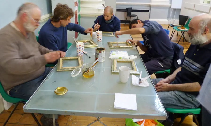 People learning how to gild