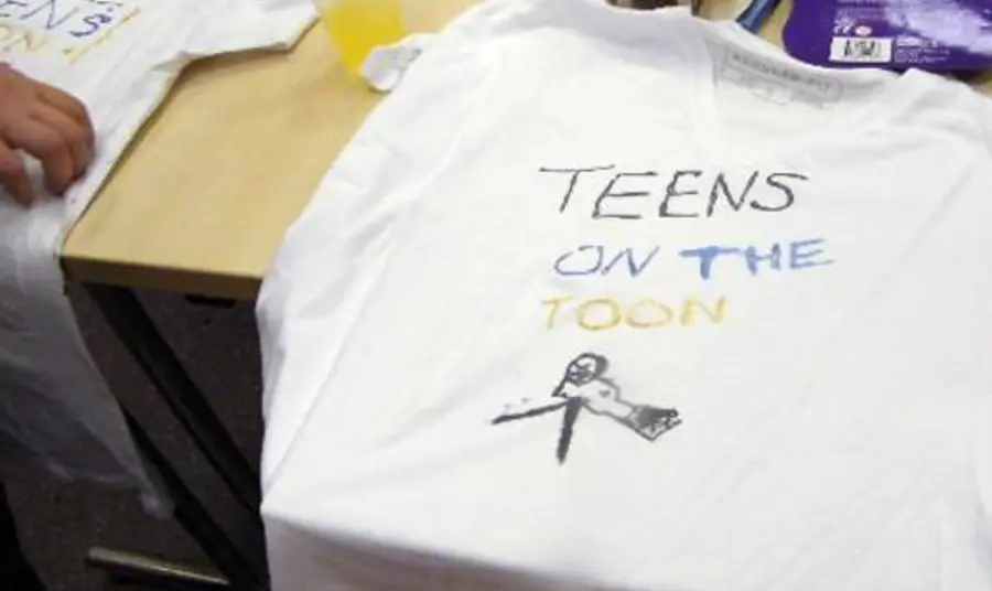 Young people creating their own tee-shirts
