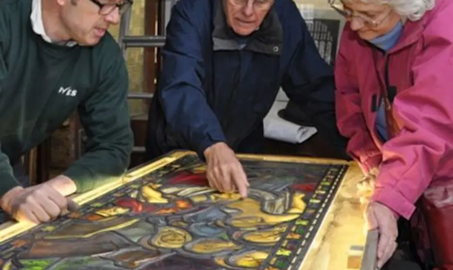 Participants examining a stained glass window Participants examining a stained glass window at All Saint’s Church, Silkstone
