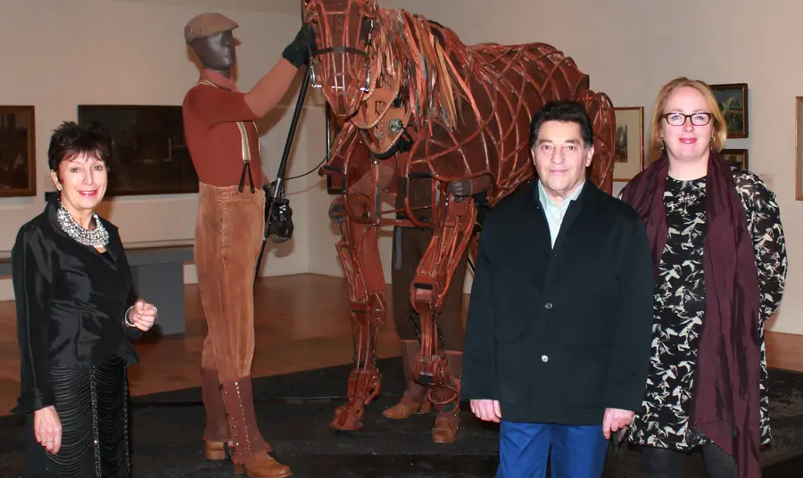 People with a horse puppet