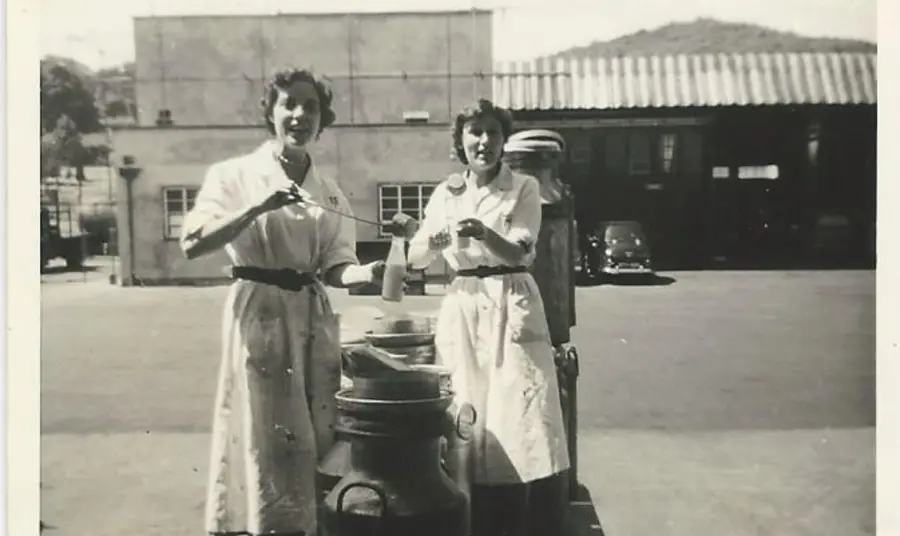 The experiences of women workers in the manufacturing industries in Wales 1945-1975 Black-and-white photograph of women factory workers
