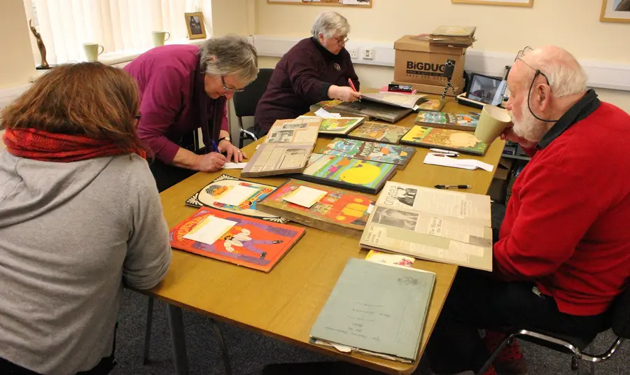 Participants logging archive materials
