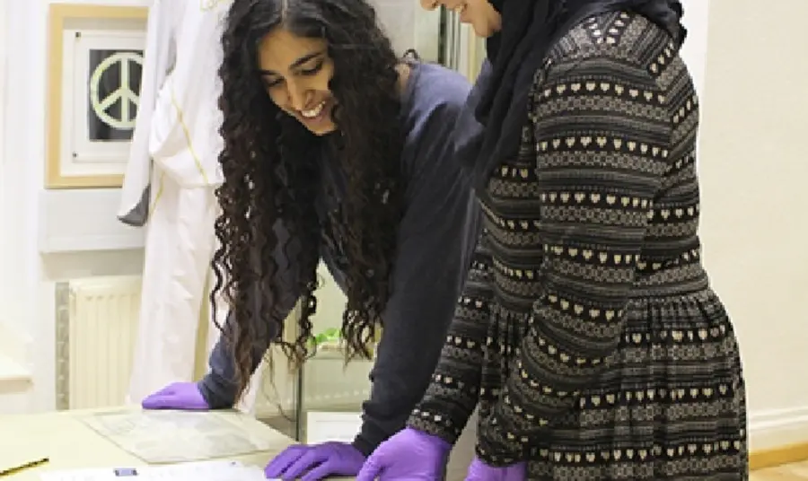 No Man’s Land – young people uncover women’s viewpoints on the First World War Hanna Ahmed (left) and Nazish Majid looking at items from the archive at The Peace Museum, Bradford
