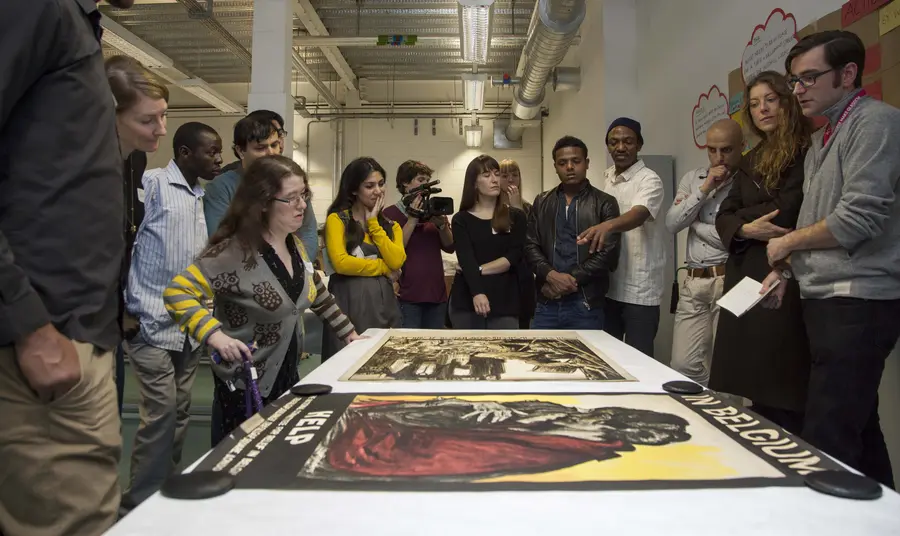 Participants discussing one of the exhibition items