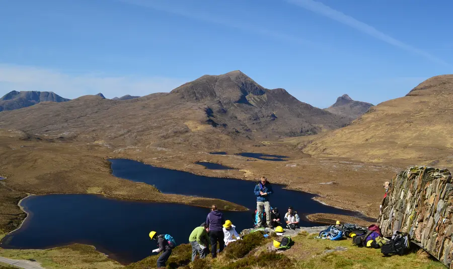 Volunteers learn more about the dramatic landscapes at Knockan Crag.