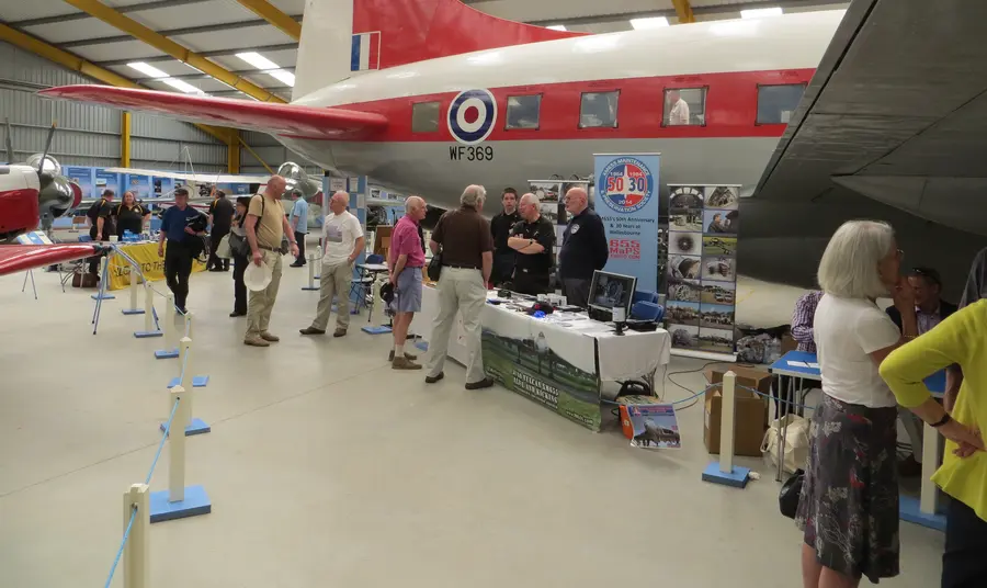Visitors and an aircraft at Newark Air Museum South Field Site Display Hall