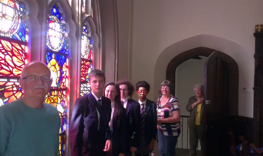 Friends of Stoke Minster with the newly restored First World War memorial window