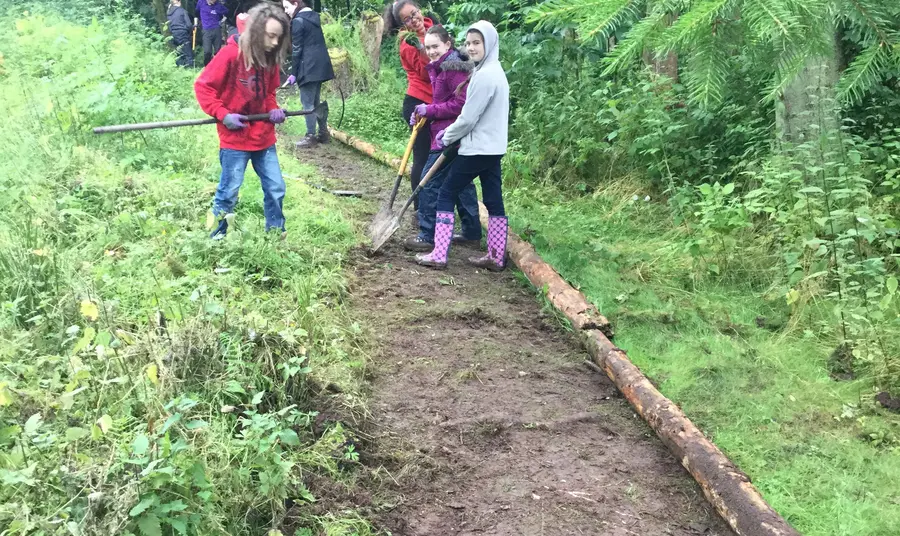Woodland Futures Young people clearing and maintaining paths