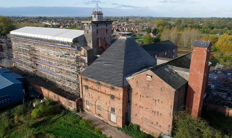 Aerial view of the Shrewsbury Flaxmill building being renovated and covered in scaffolding