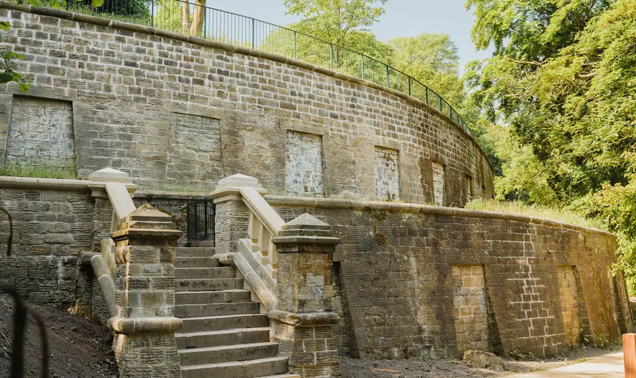 The stone built catacombs at the cemetery, with steps leading up to the upper level.