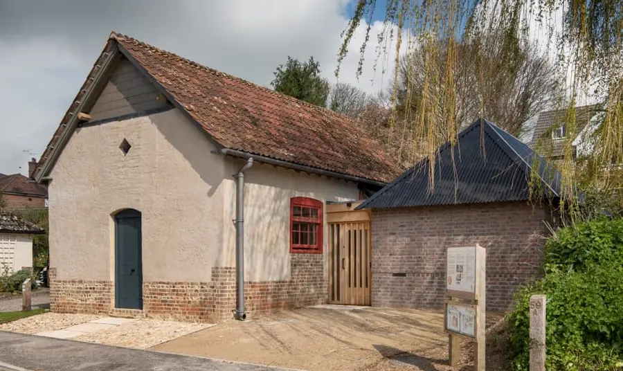 A restored building with a new-build on its left