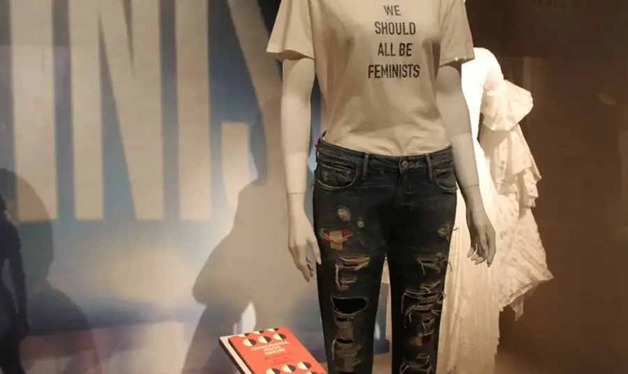 A mannequin in a T-shirt saying 'we should all be feminists'