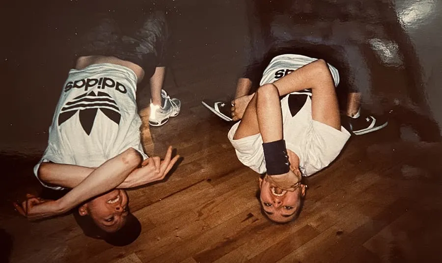 Two people breakdancing