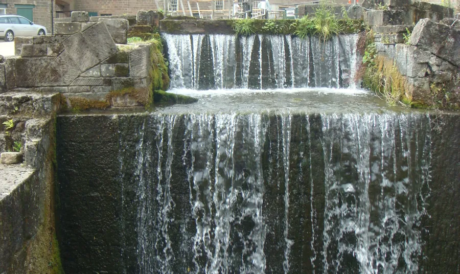 Cromford Mills waterfall and main building