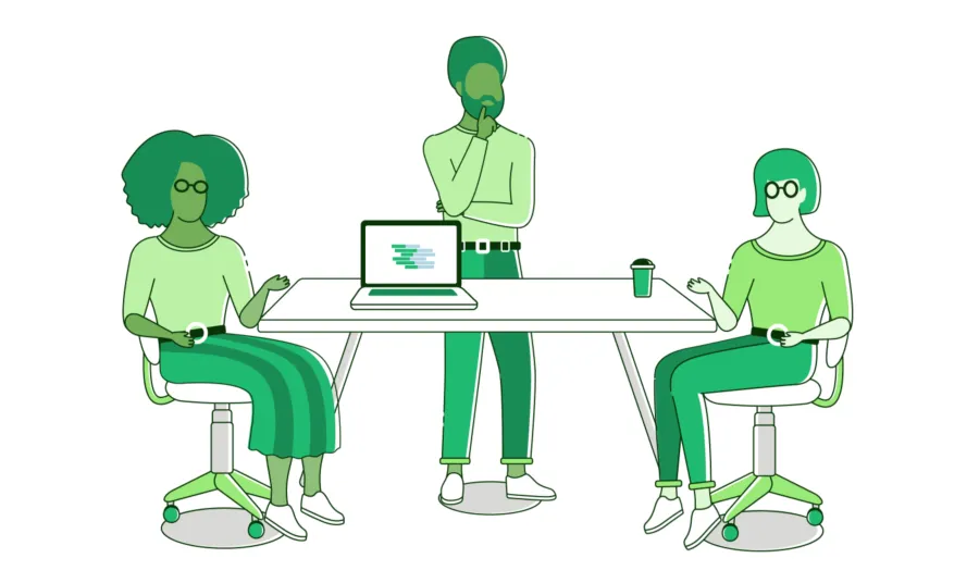 Three people sitting around a laptop