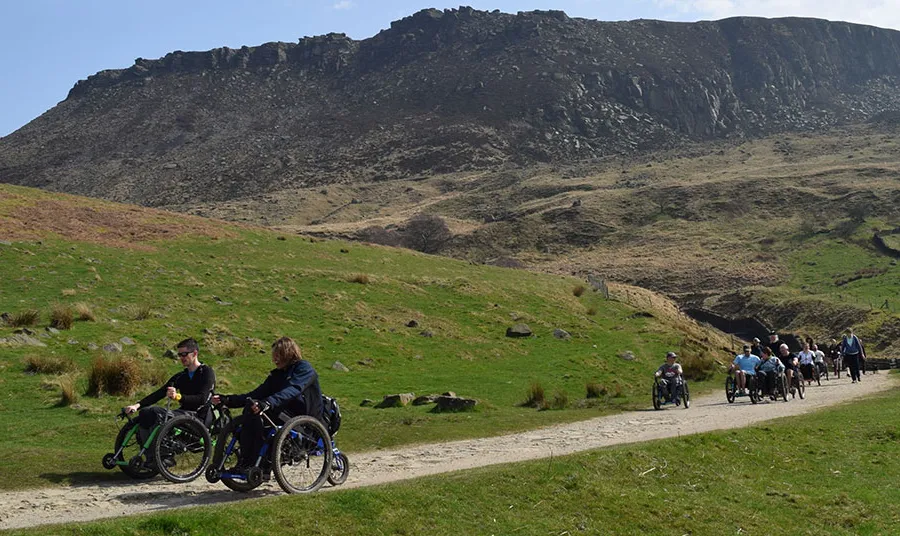 Experience Community CIC wheelchair users enjoying the countryside